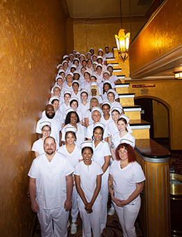 students in nurse white uniforms