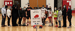 Group photo of athletes, trainer, nurse
