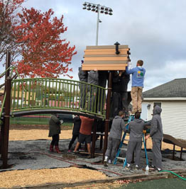 Volunteers building playground