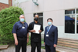 Joseph Beverly with certificate